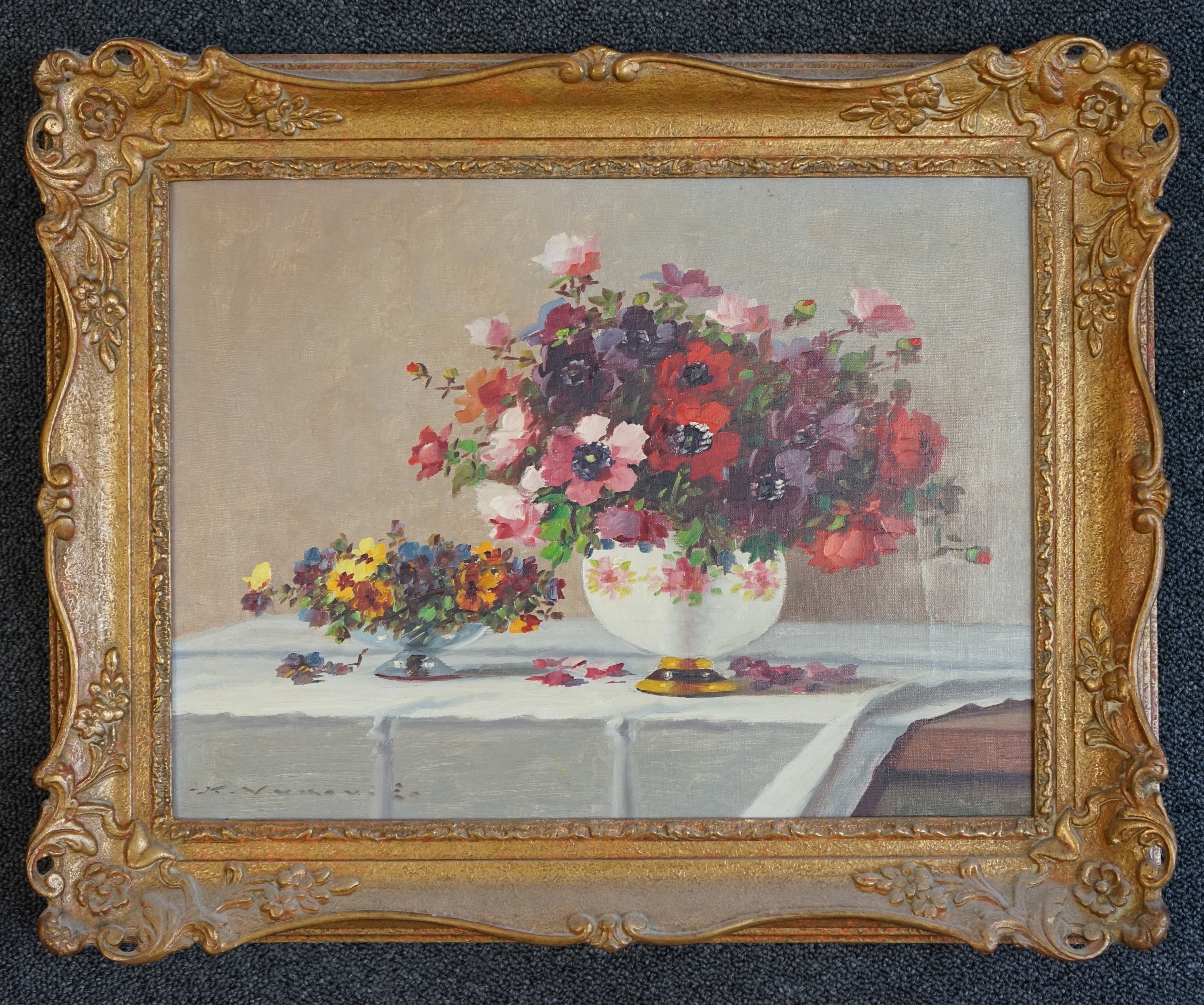 Karl Vukovic (1897-1973), oil on canvas, Still life of flowers on a table top, signed, Stacy Marks label verso, 30 x 40cm